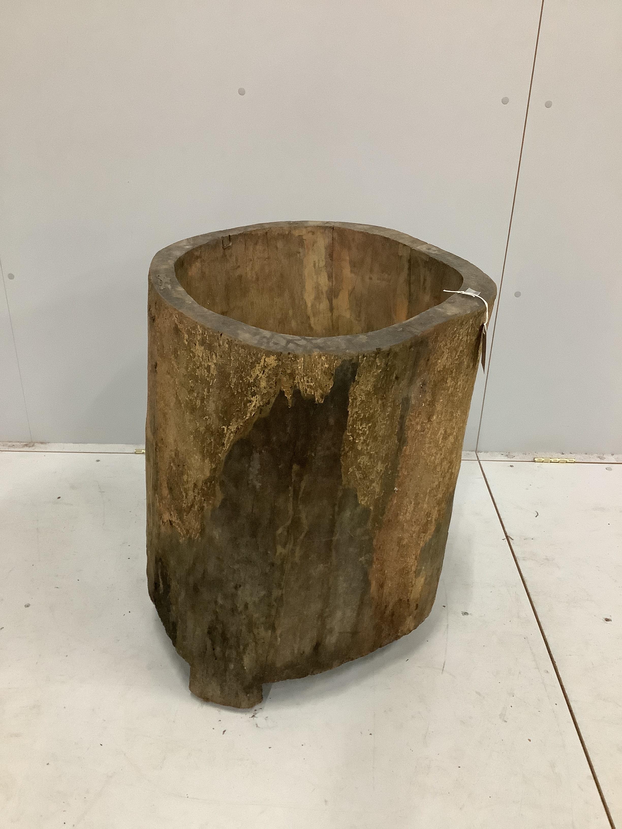 A Provincial circular wooden mortar, diameter 50cm, height 71cm